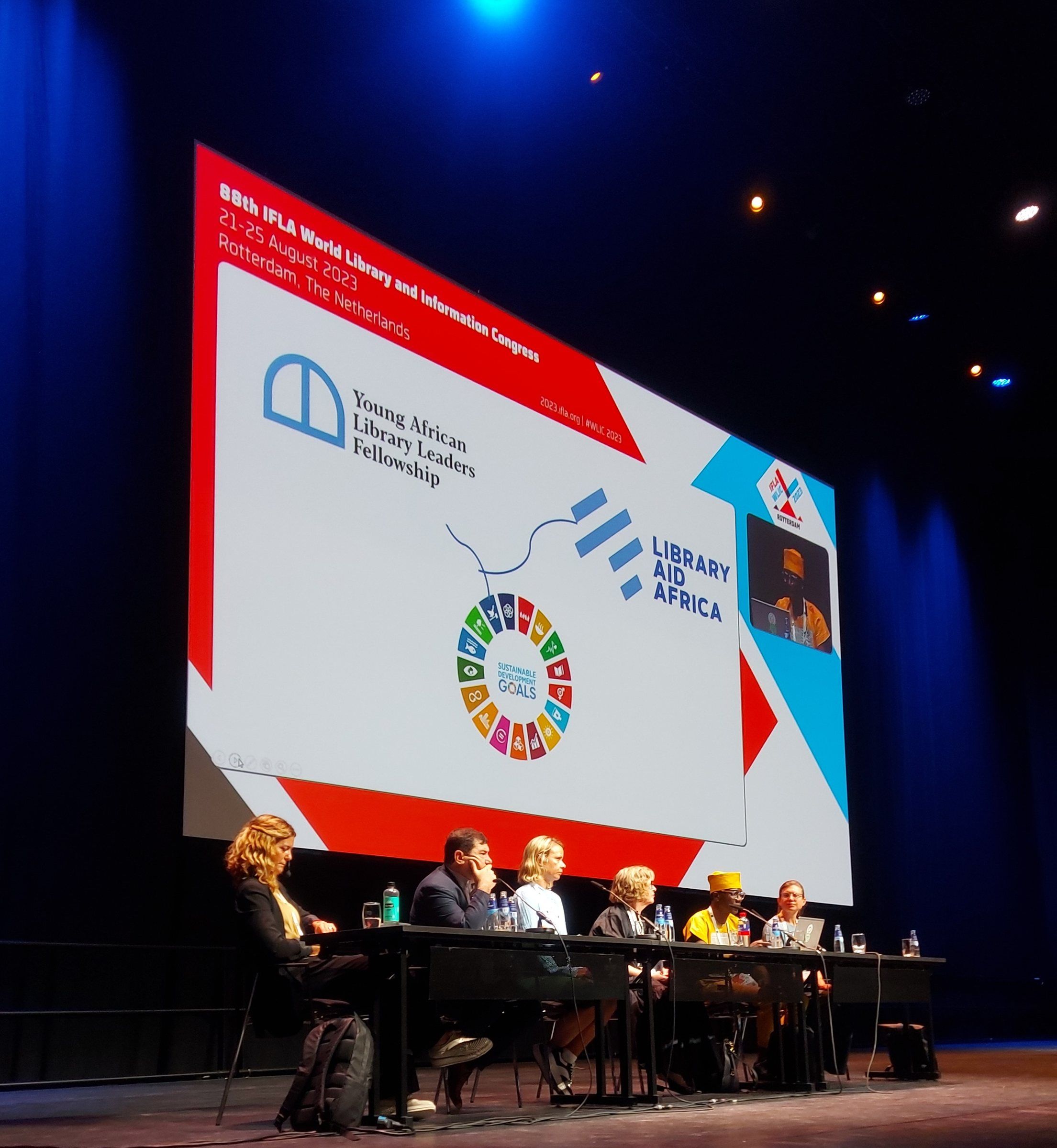 Library Aid Africa presenting the Young African Library Leaders Fellowship on stage at the IFLA World Library and Information Congress